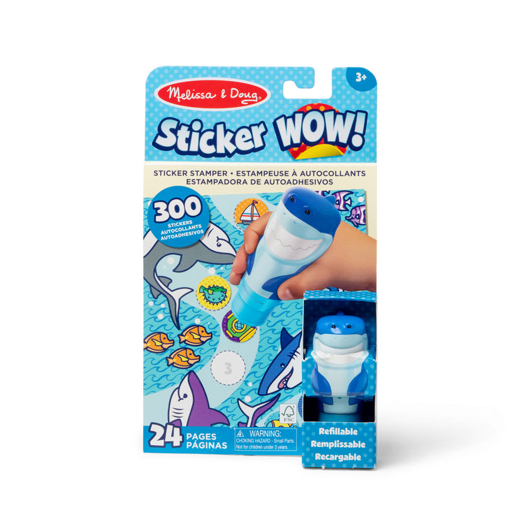 The front of the box for The Melissa & Doug Sticker WOW!™ 24-Page Activity Pad and Sticker Stamper, 300 Stickers, Arts and Crafts Fidget Toy Collectible Character – Shark