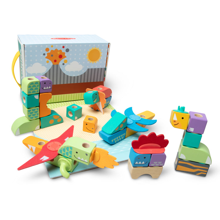 A kid playing with The Melissa & Doug Blockables™ Dinosaur Snap And Play, Mix And Match Connectable Wooden Building Blocks Play Set Toy for Preschool Boys And Girls (69 Pcs)