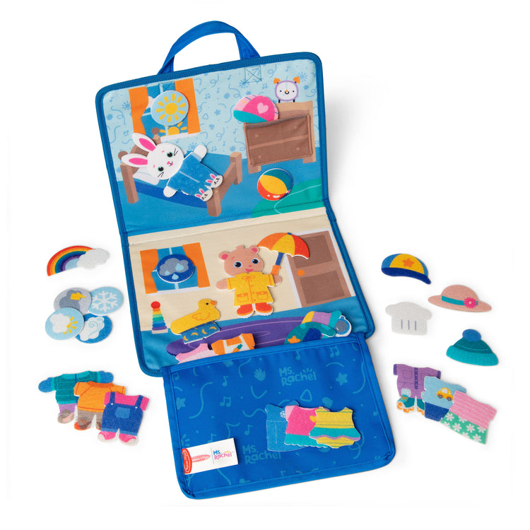 A kid playing with The Melissa & Doug® Ms. Rachel™ What to Wear Felt Activity Board Take-Along Preschool Learning Toy for Boys and Girls