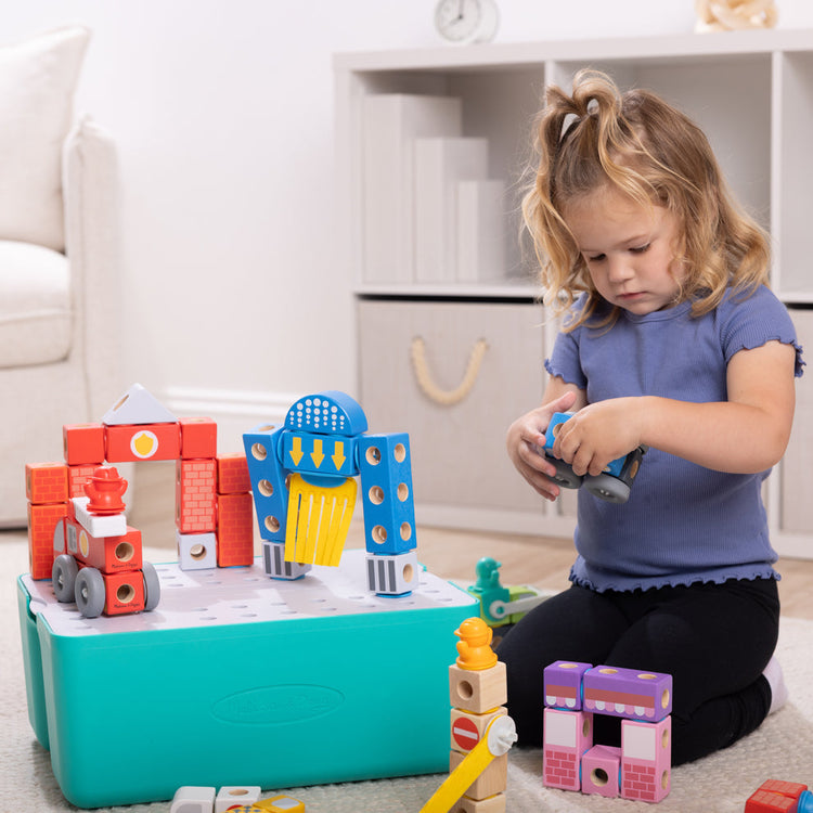 Melissa & Doug Toy Spotlight Blockables City Deluxe Play Set child playing