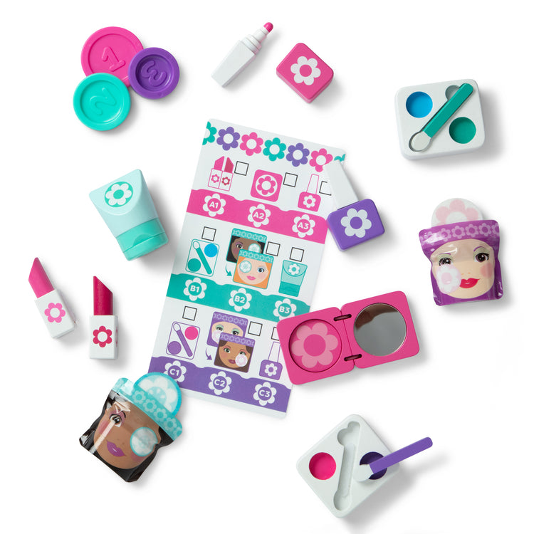 The loose pieces of The Melissa & Doug Sort, Stock, Select Beauty Kiosk Vending Machine Play Set, Pretend Makeup Wooden Toy For Boys and For Girls 3+