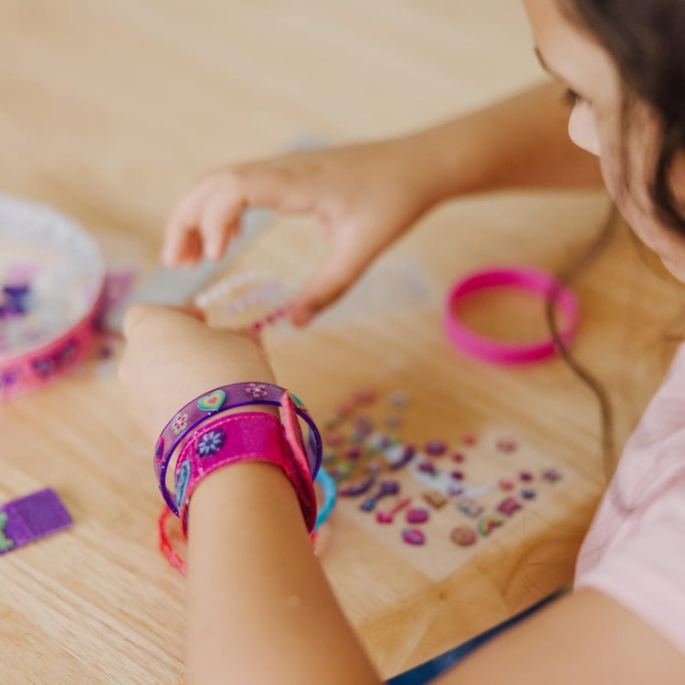 The front of the box for the Melissa & Doug Design-Your-Own Bracelets With 100+ Sparkle Gem and Glitter Stickers